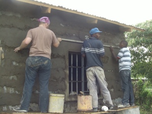 Fr. Patrick & friends working on pointing the front wall.